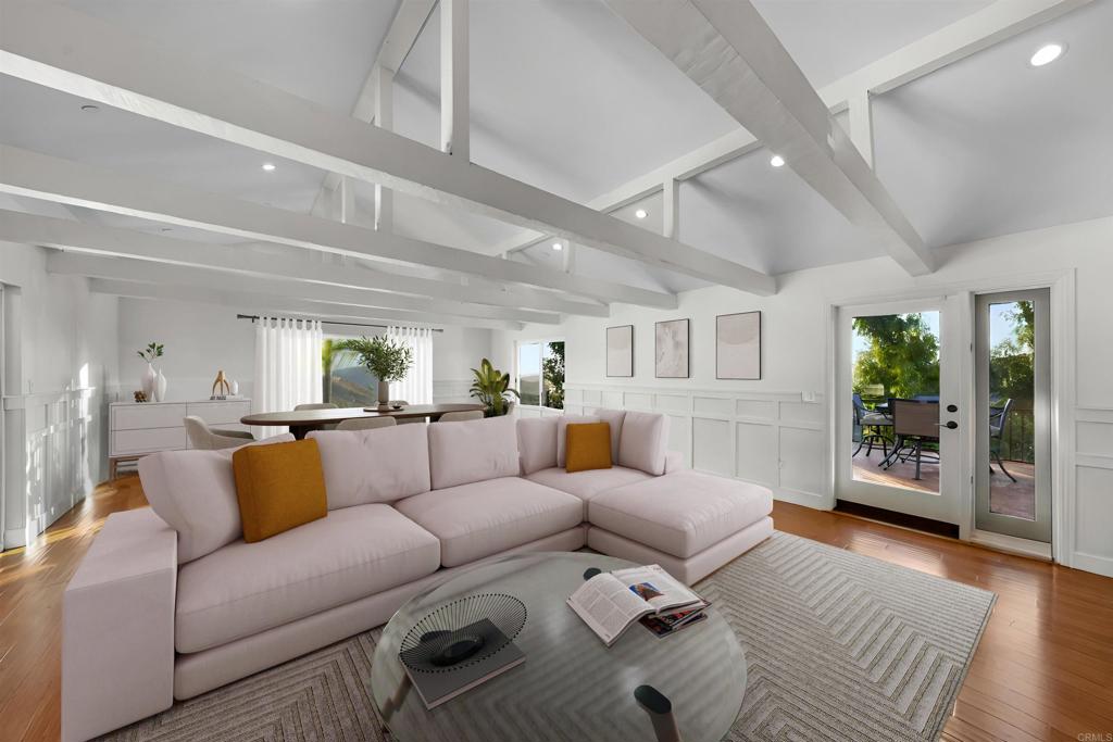 14062 Jamacha Hills Road Jamul, CA 91935 - Photo 14 of 39 a living room with furniture and wooden floor