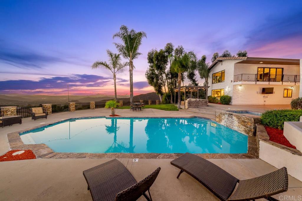 14062 Jamacha Hills Road Jamul, CA 91935 - Photo 27 of 39 a view of a swimming pool with a patio