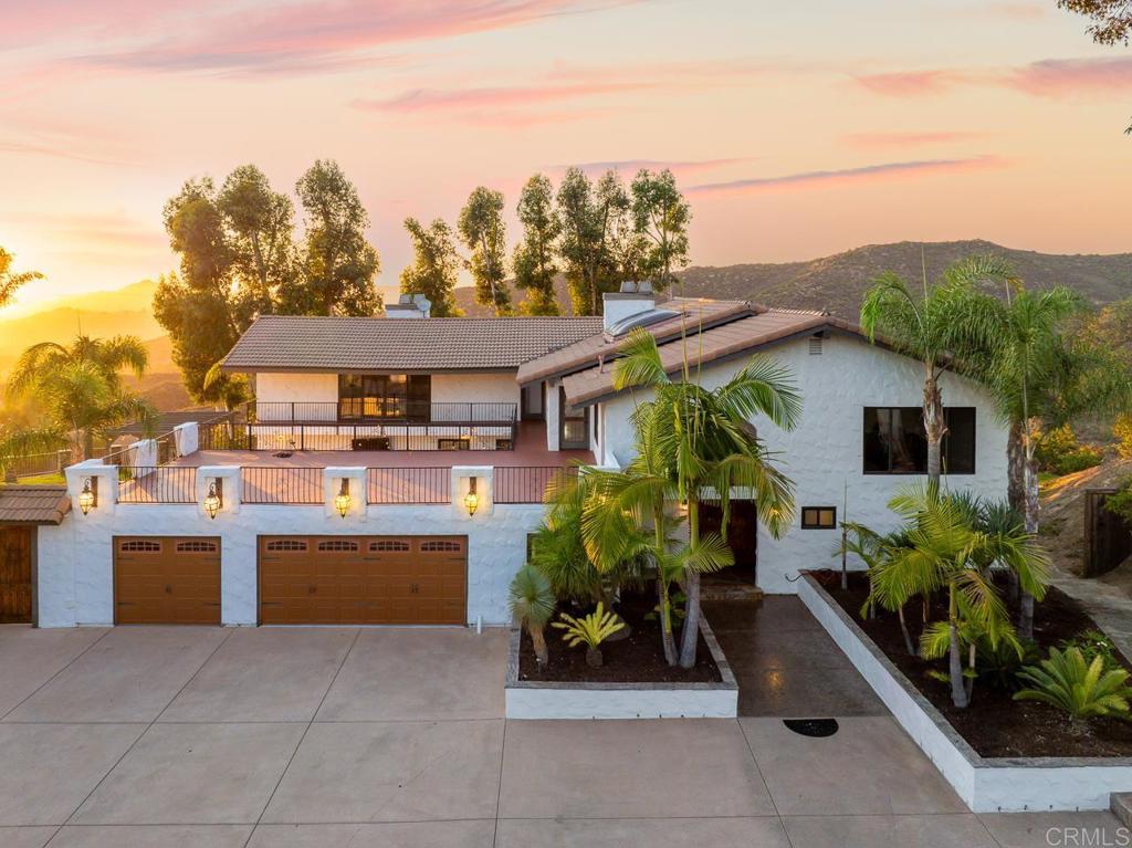 14062 Jamacha Hills Road Jamul, CA 91935 - Photo 3 of 39 a front view of a house with a yard