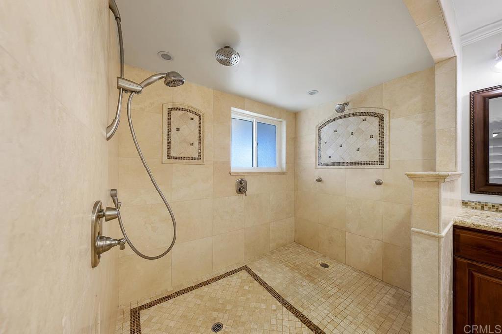 14062 Jamacha Hills Road Jamul, CA 91935 - Photo 10 of 39 a bathroom with a shower a mirror and a sink