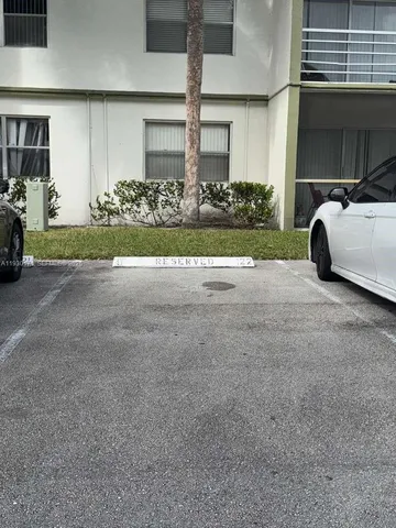 a view of a house with a garden