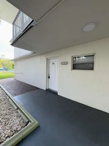 a view of a room with a rug