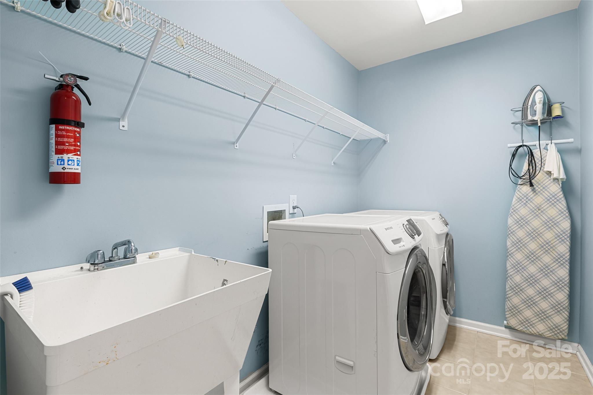 719 Deerbrook Lane Tega Cay, SC 29708 - Photo 20 of 33 a utility room with dryer and washer