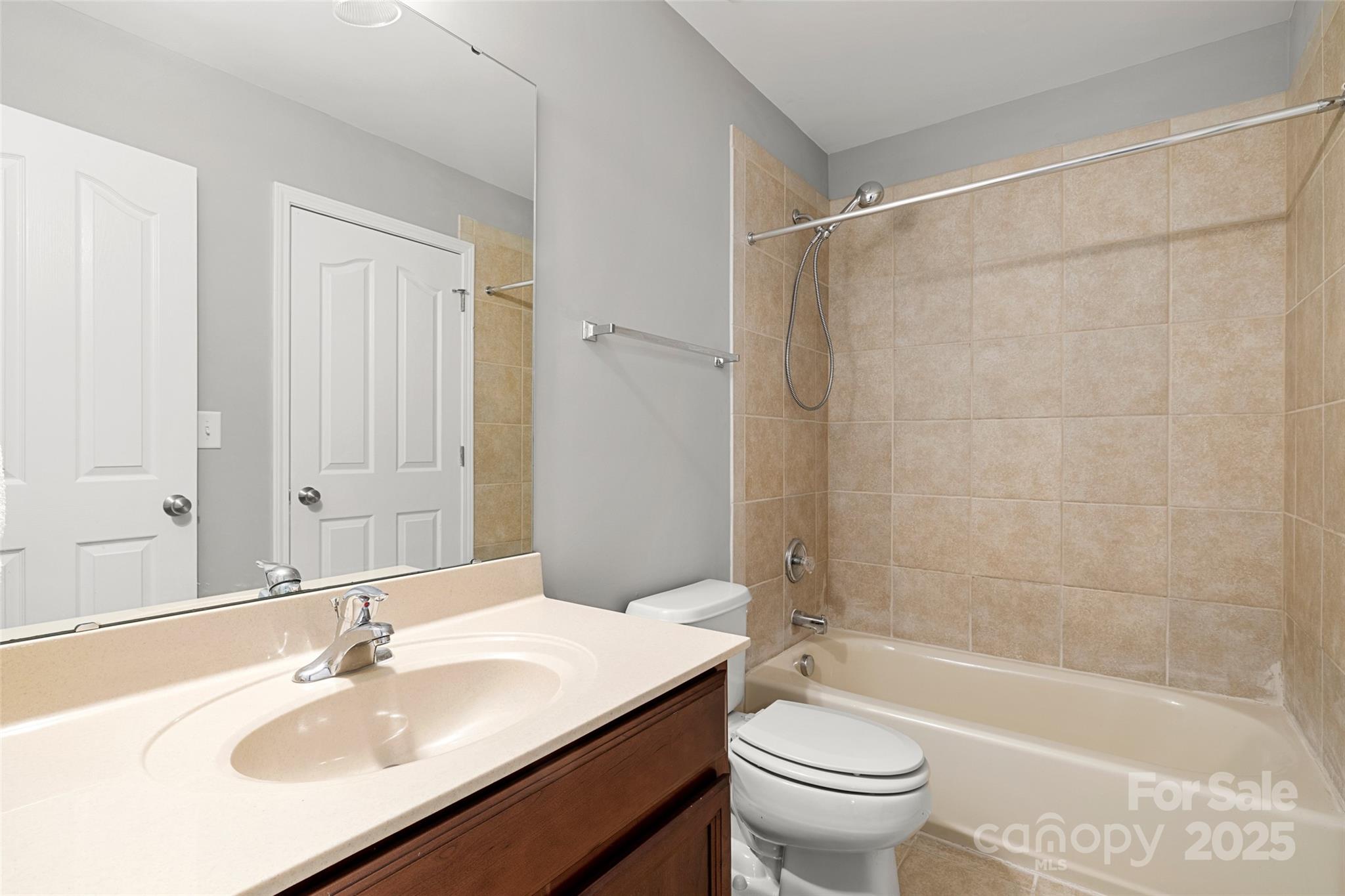 719 Deerbrook Lane Tega Cay, SC 29708 - Photo 23 of 33 a bathroom with a sink toilet and shower