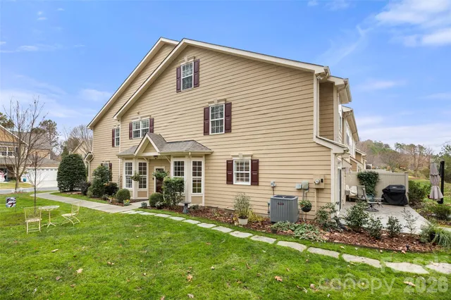 a backyard of a house with lots of green space