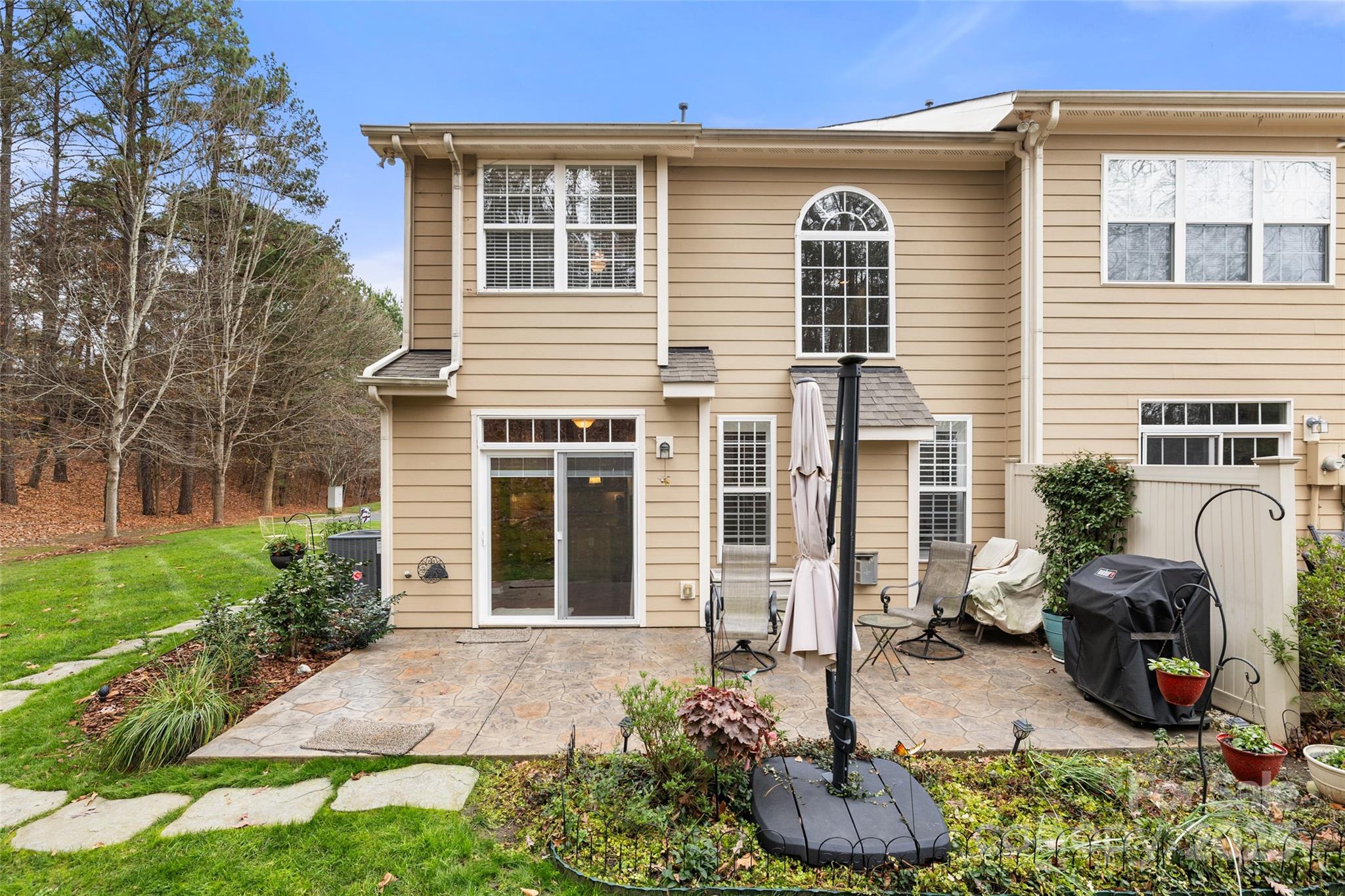 719 Deerbrook Lane Tega Cay, SC 29708 - Photo 24 of 33 a front view of a house with garden