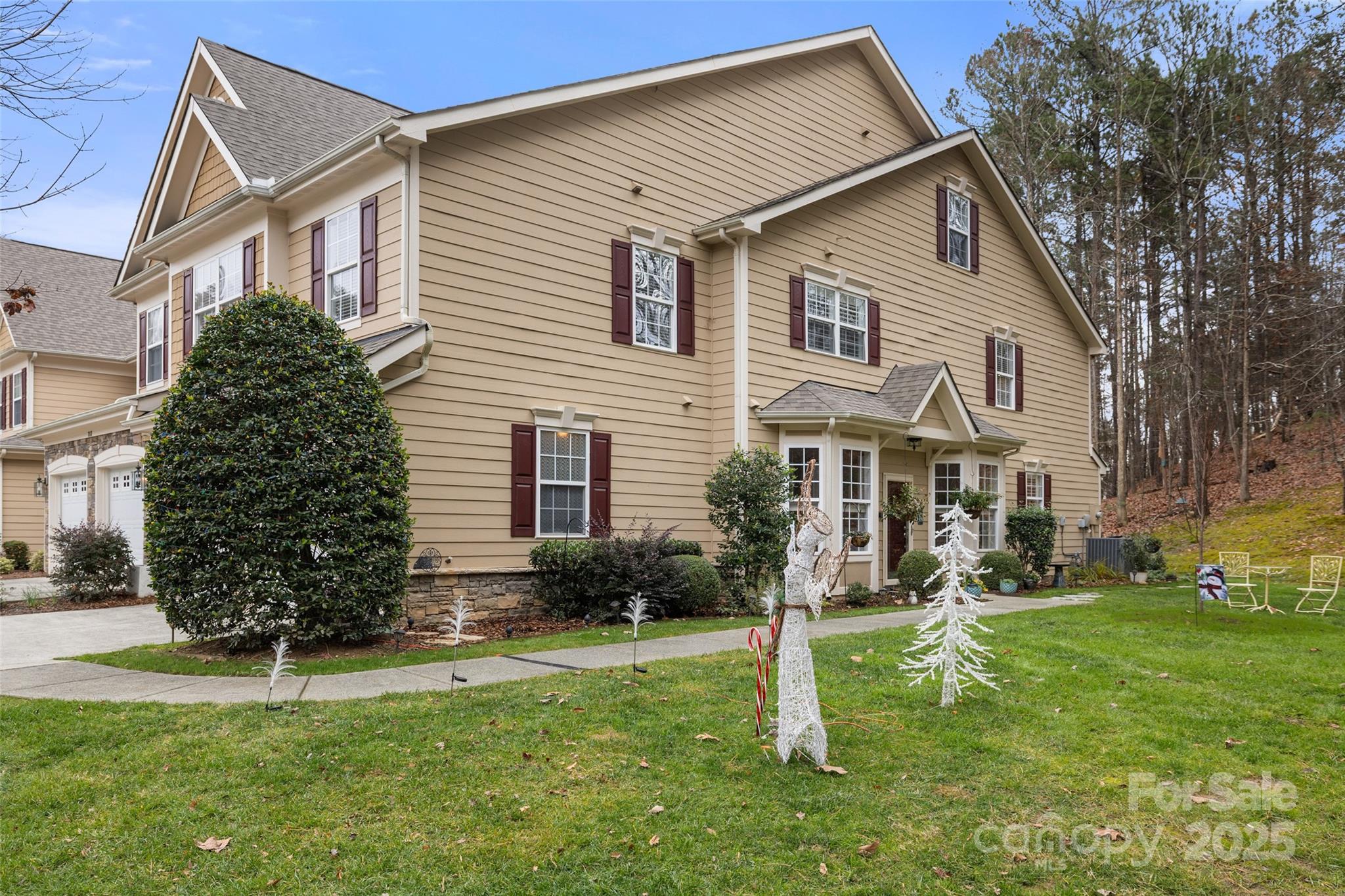 719 Deerbrook Lane Tega Cay, SC 29708 - Photo 26 of 33 a front view of a house with a yard