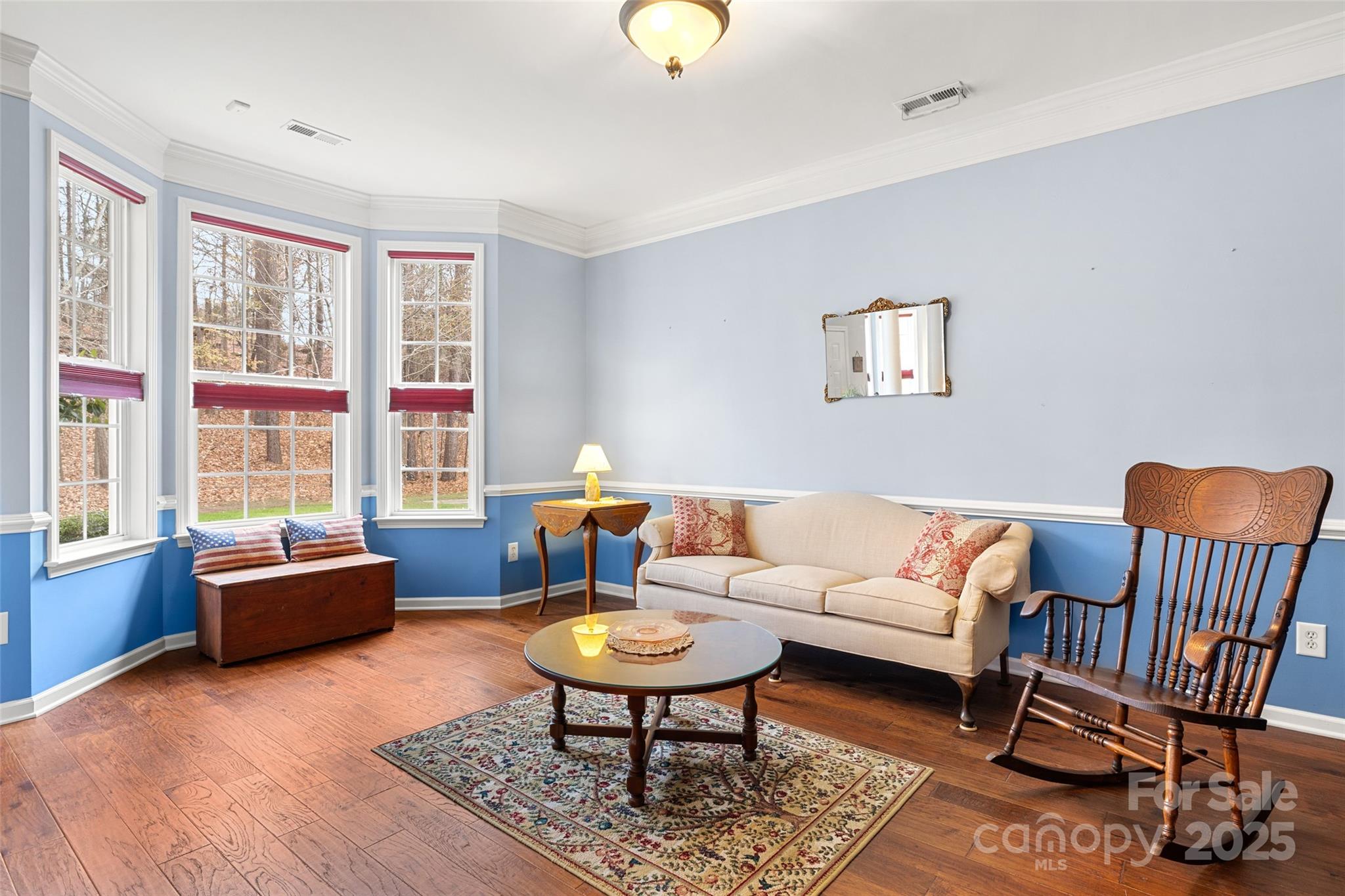719 Deerbrook Lane Tega Cay, SC 29708 - Photo 4 of 33 a living room with furniture and a window