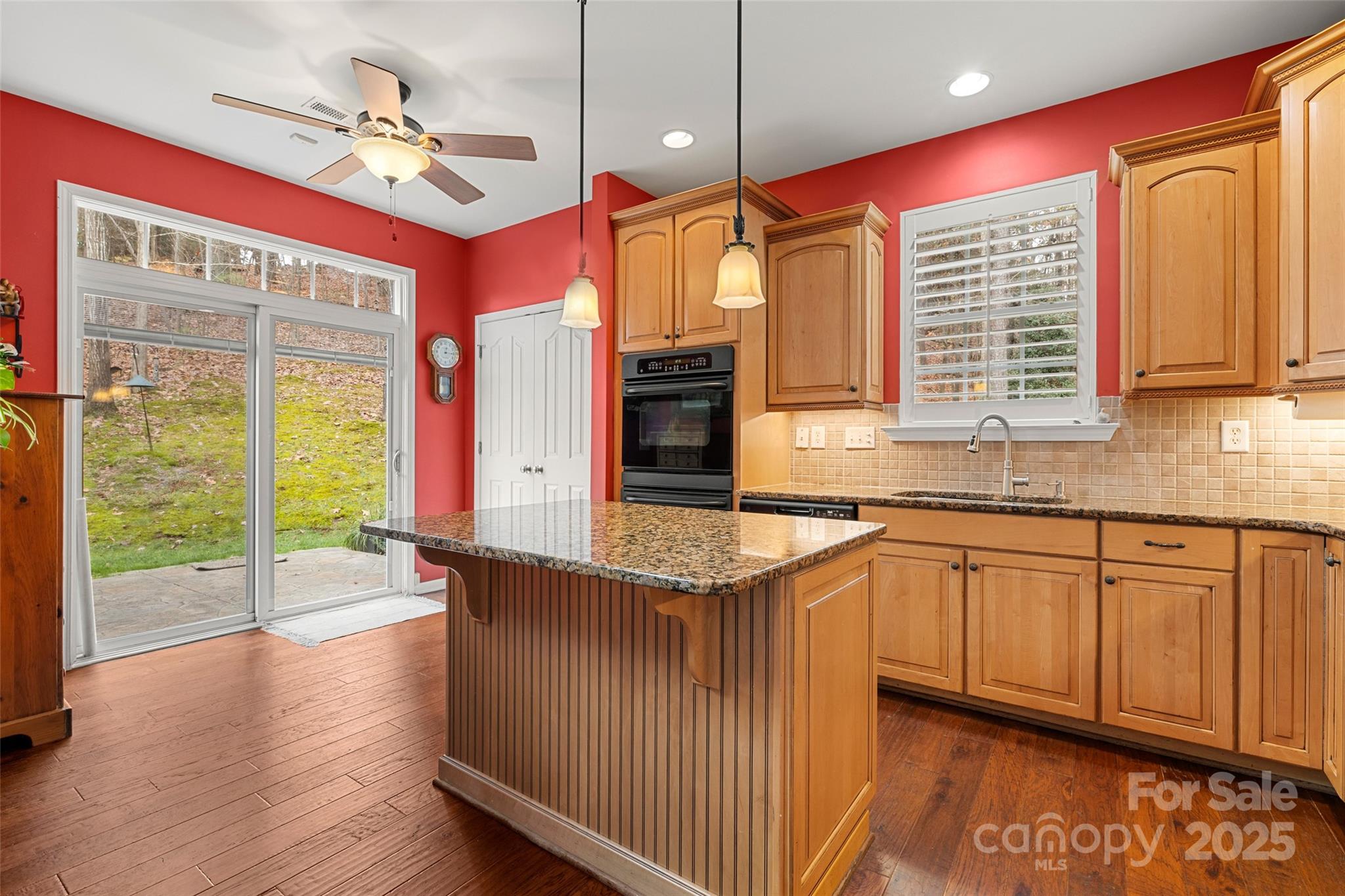 719 Deerbrook Lane Tega Cay, SC 29708 - Photo 8 of 33 a kitchen with stainless steel appliances granite countertop a stove a sink and a refrigerator