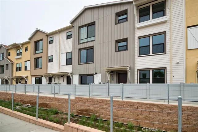 a front view of a building with glass windows