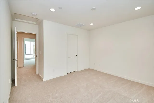 an empty room with a natural light