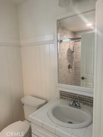 a bathroom with a sink and a toilet