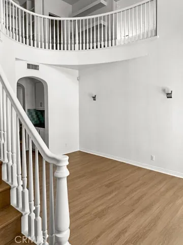 a view of entryway with wooden floor