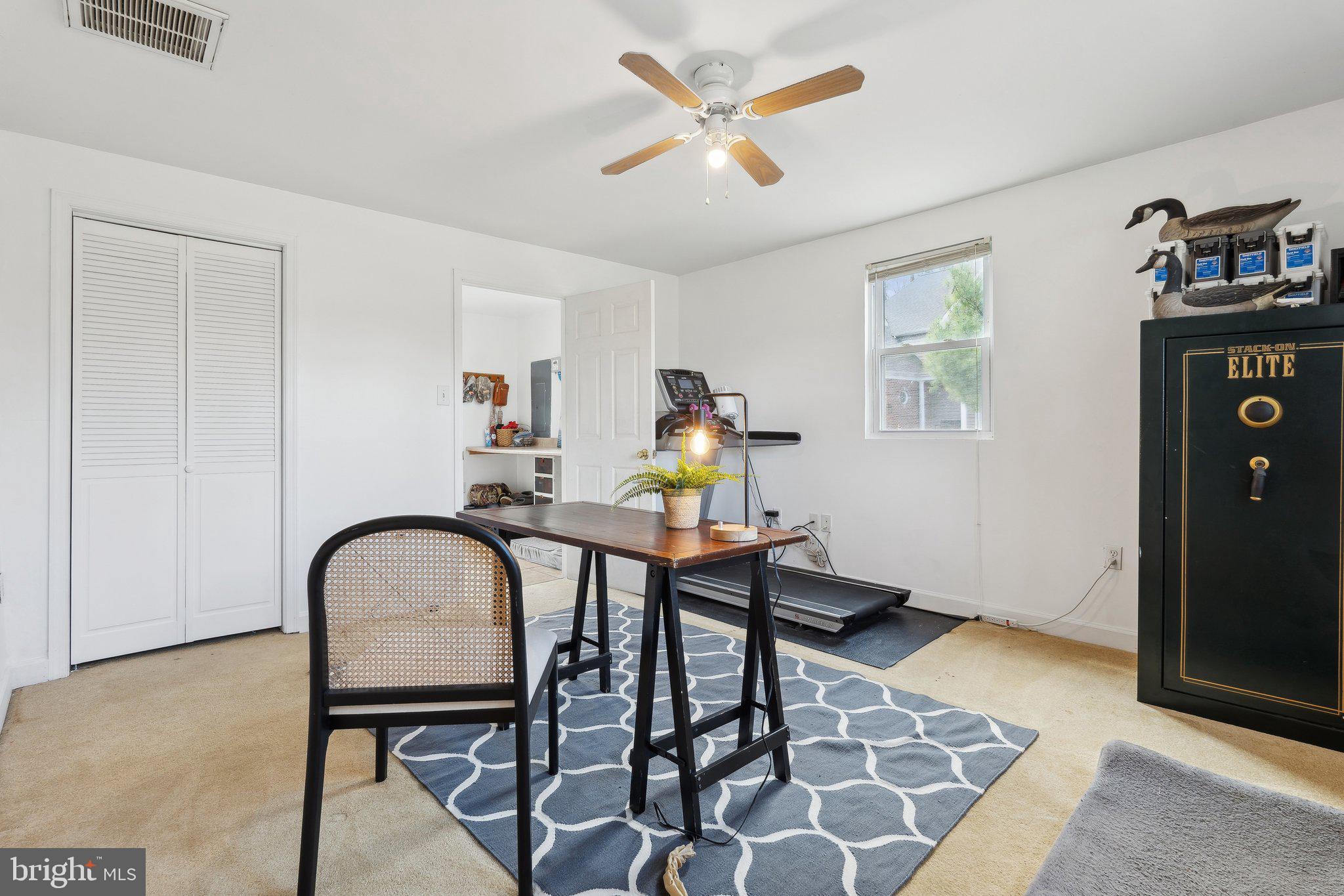 937 Winding Road Edgewater, MD 21037 - Photo 23 of 42 a living room with furniture and a window