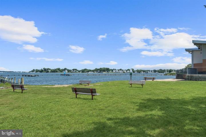937 Winding Road Edgewater, MD 21037 - Photo 30 of 42 a view of a lake with houses in the back