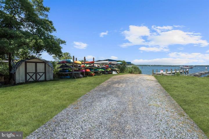 937 Winding Road Edgewater, MD 21037 - Photo 33 of 42 a view of a street with a house in the background