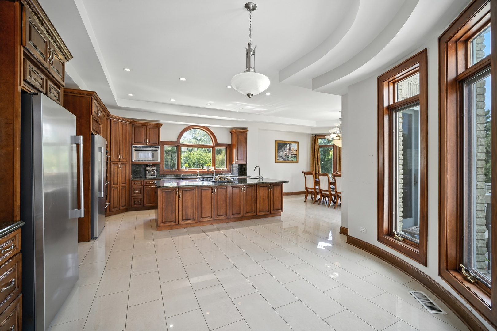 1100 MacAlpin Drive Inverness, IL 60010 - Photo 33 of 50 a lobby with furniture and a chandelier