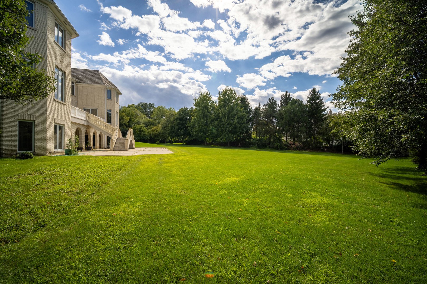 1100 MacAlpin Drive Inverness, IL 60010 - Photo 45 of 50 a house view with swimming pool in front of it