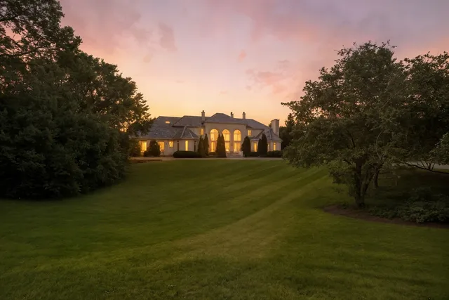 a view of a lake with a yard