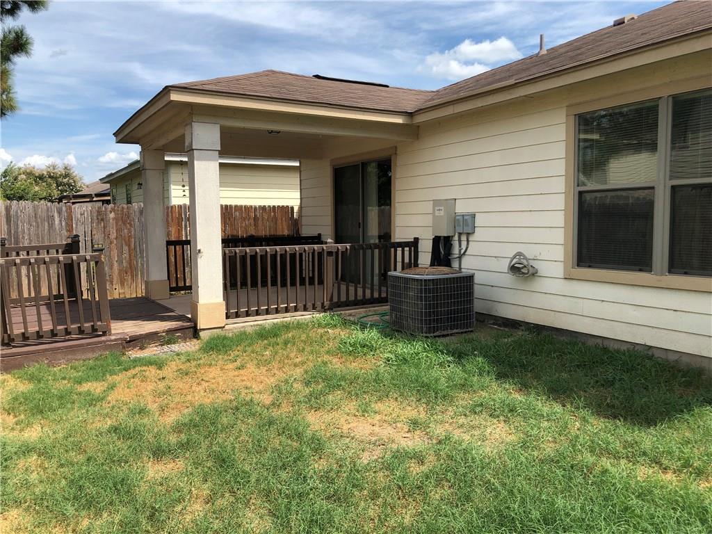 6912 Walkup Lane Austin, TX 78747 - Photo 2 of 14 a view of a house with backyard and porch