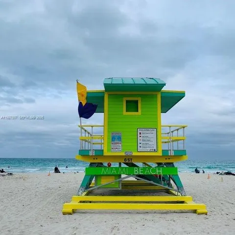 a view of swimming pool with outdoor seating