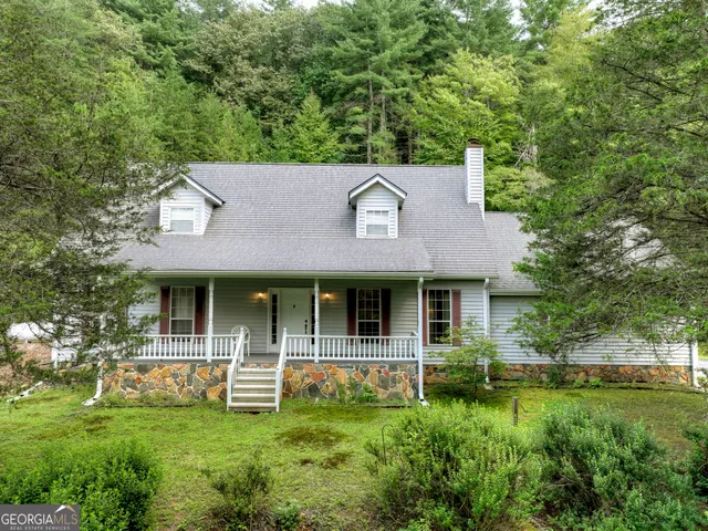 a view of a house with a garden