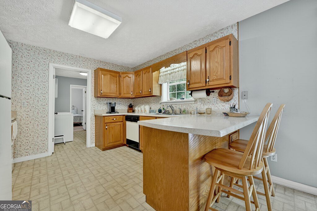 1362 Cherry Log Street Cherry Log, GA 30522 - Photo 13 of 55 a kitchen with a sink cabinets and window