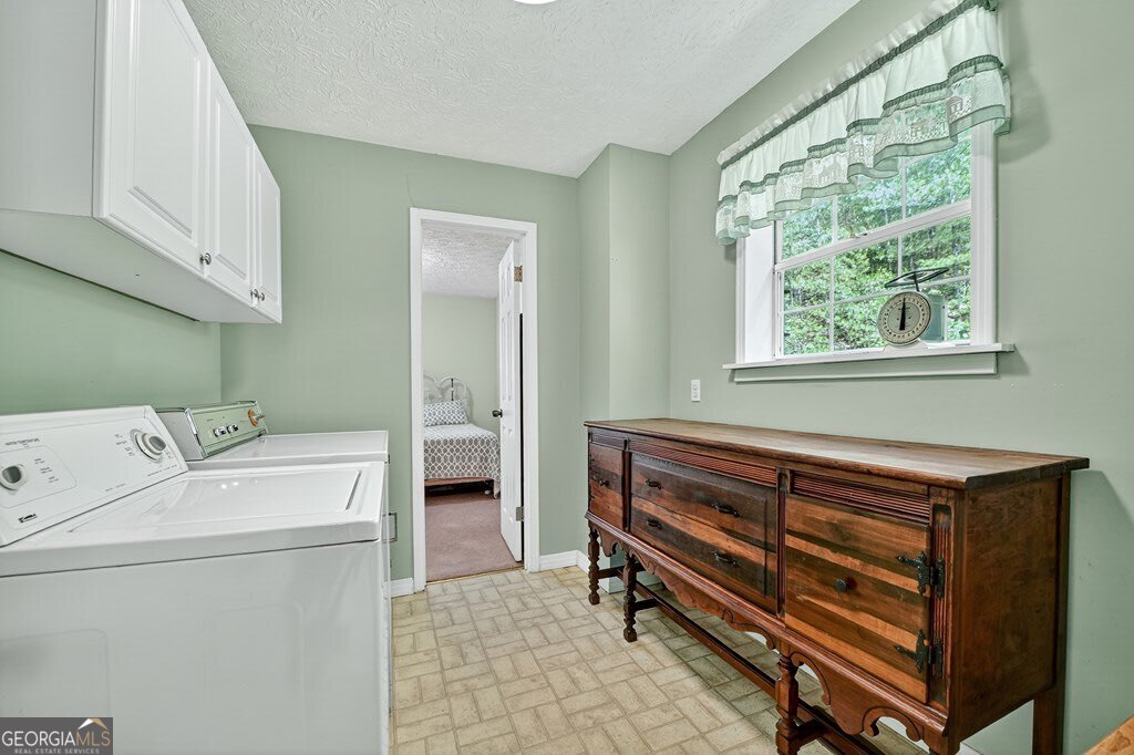 1362 Cherry Log Street Cherry Log, GA 30522 - Photo 18 of 55 a utility room with dryer and washer