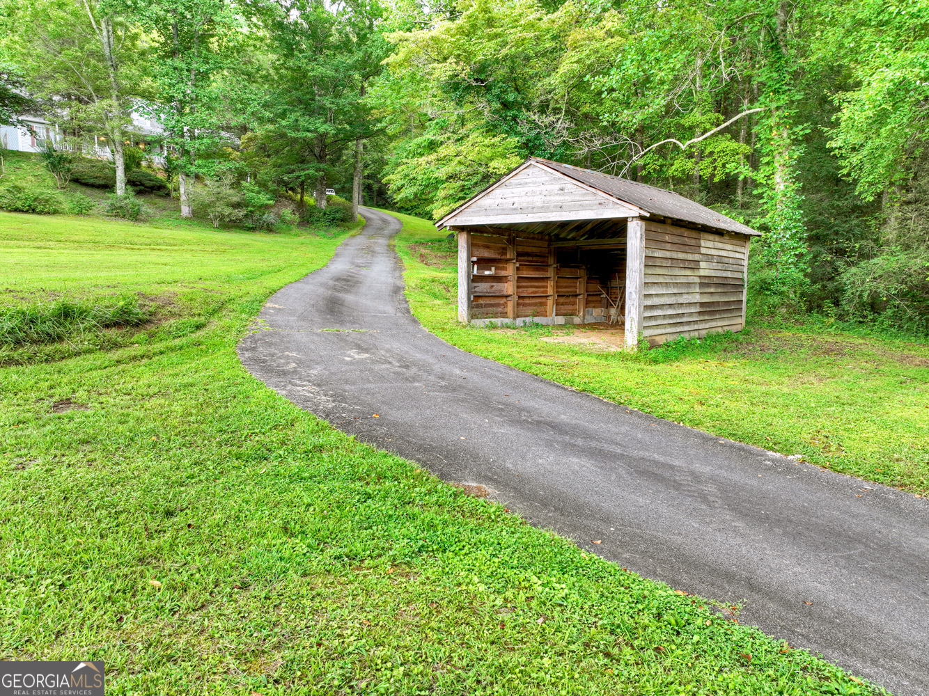 1362 Cherry Log Street Cherry Log, GA 30522 - Photo 51 of 55 a front view of a house with garden