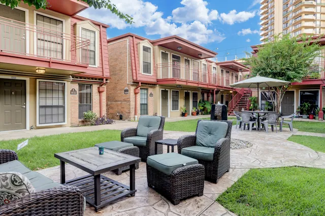 a view of a swimming pool with a lounge chairs