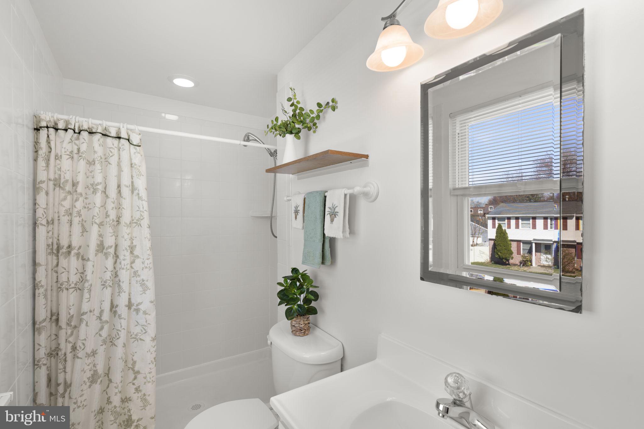 108 North Garfield Road Sterling, VA 20164 - Photo 19 of 31 Master BR bath w/ step-in shower,tile floor