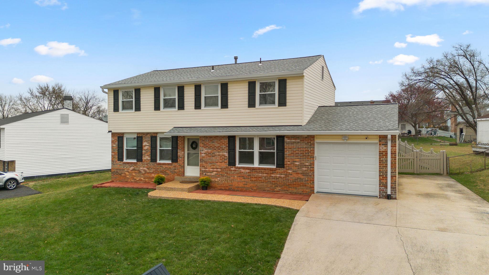 108 North Garfield Road Sterling, VA 20164 - Photo 2 of 31 Driveway has room for 4 cars