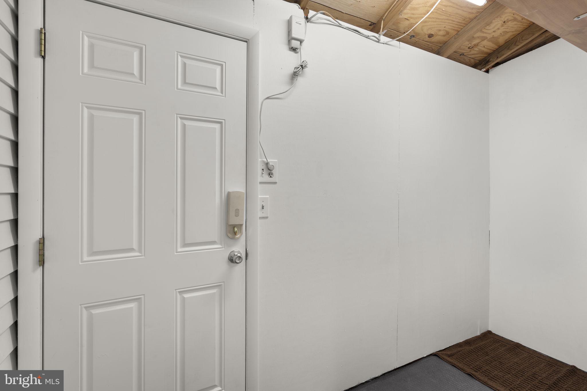 108 North Garfield Road Sterling, VA 20164 - Photo 24 of 31 Storage room w/electric outlets & door to backyard
