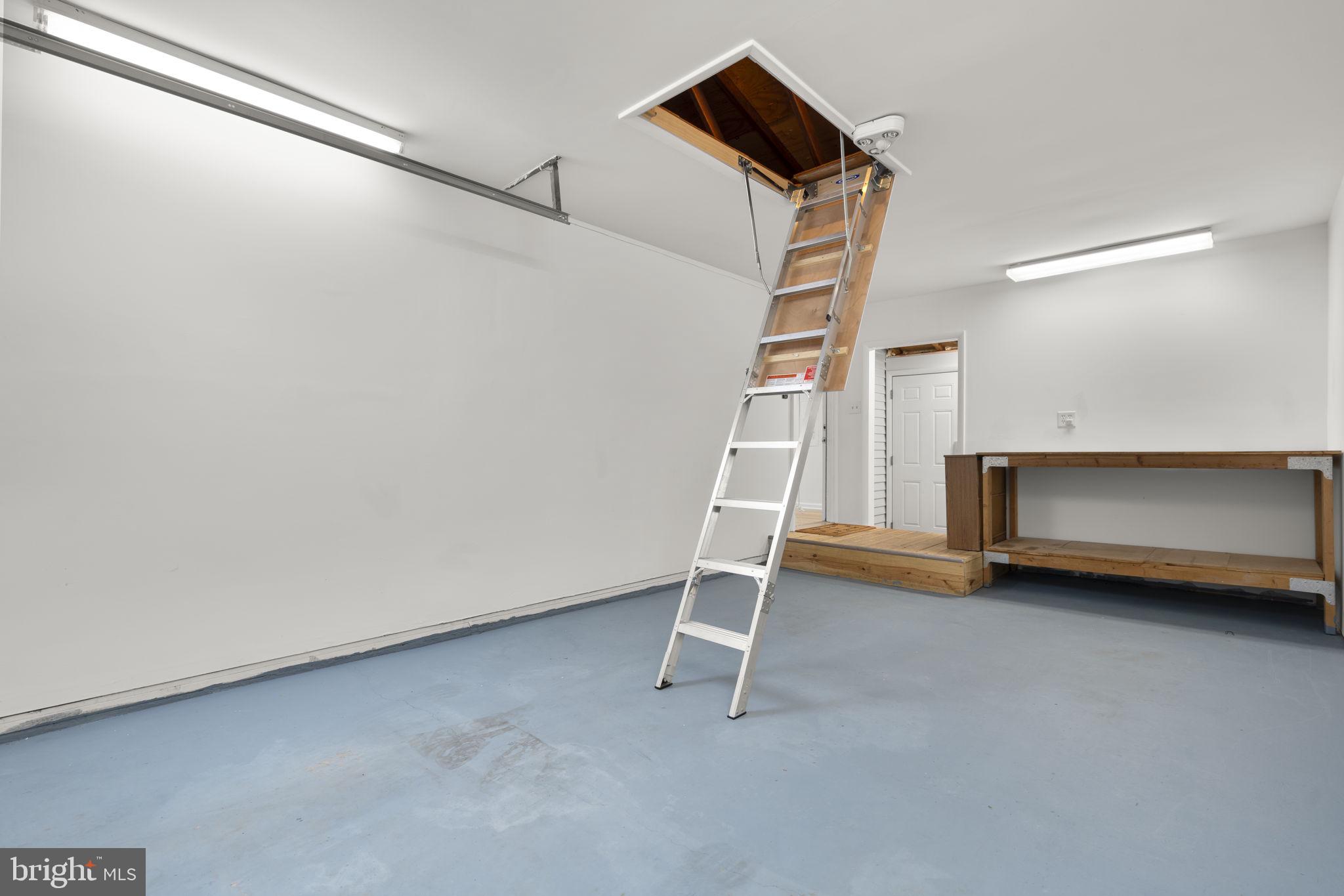 108 North Garfield Road Sterling, VA 20164 - Photo 25 of 31 Access to storage above garage w/ floor & light