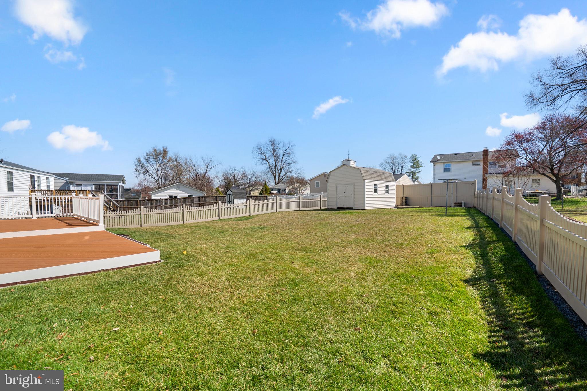 108 North Garfield Road Sterling, VA 20164 - Photo 28 of 31 Rear yard w/shed, vinyl fence, 9 ft split gate