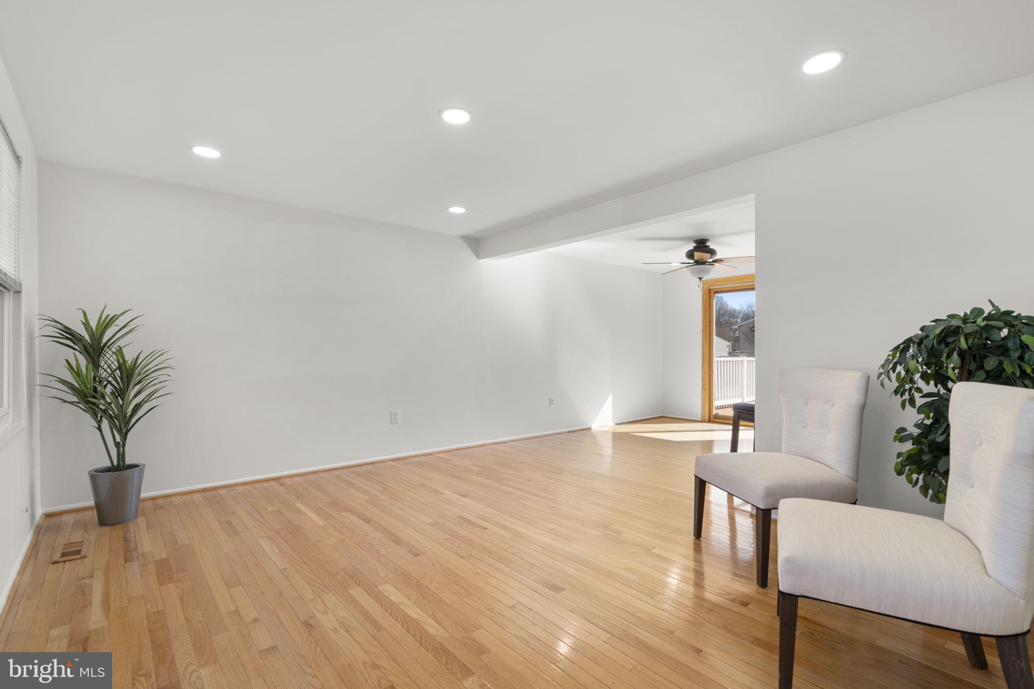 108 North Garfield Road Sterling, VA 20164 - Photo 3 of 31 Living room /dining room; genuine 3/4 " HW floor