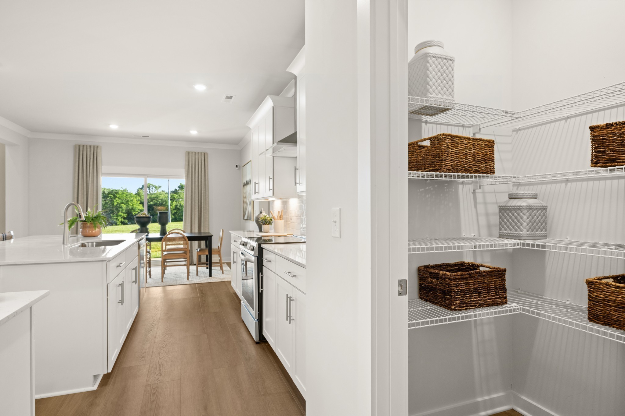 401 Mclemore Ridge Clarksville, TN 37043 - Photo 22 of 64 a kitchen with stainless steel appliances a stove a sink a refrigerator and cabinets
