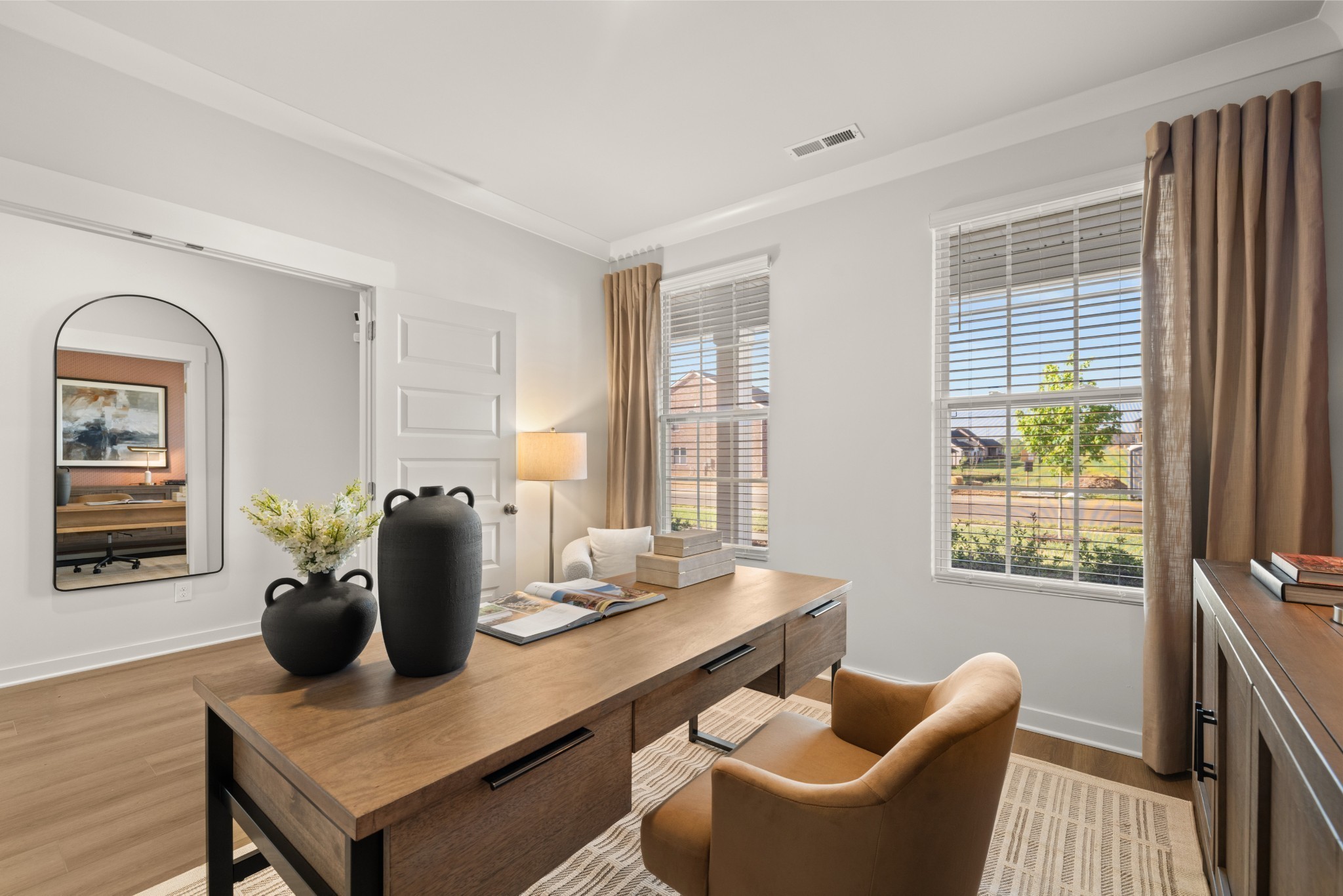 401 Mclemore Ridge Clarksville, TN 37043 - Photo 7 of 64 a dining room with furniture a window and wooden floor