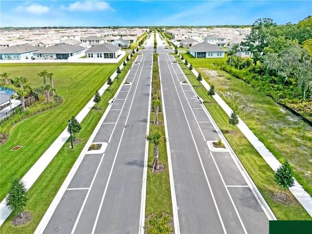 a view of house with yard