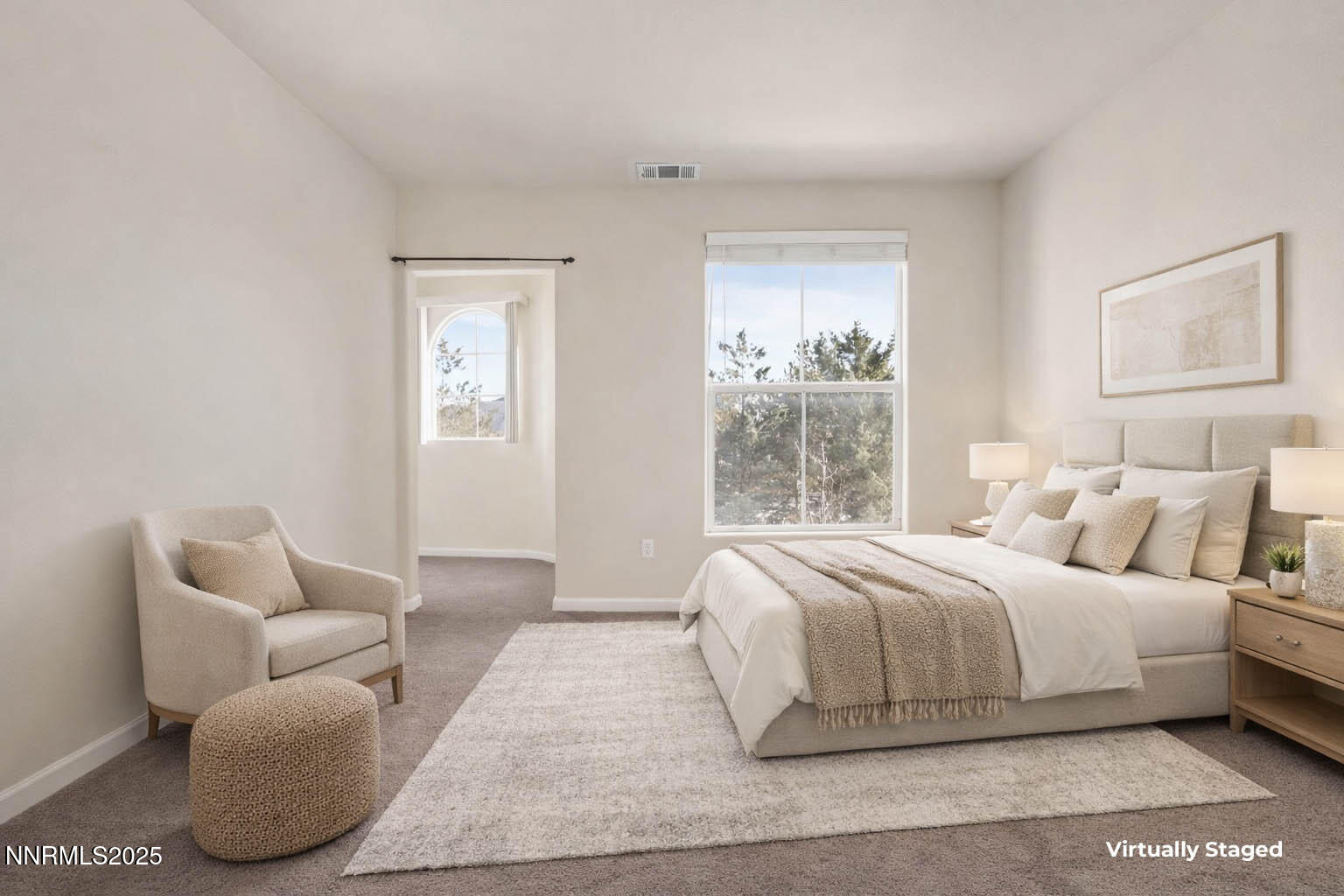 1325 South Meadows Parkway, Unit 224 Reno, NV 89521 - Photo 17 of 29 a bedroom with a bed and a couch
