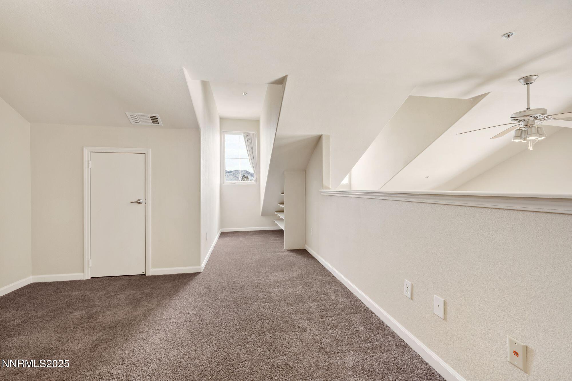 1325 South Meadows Parkway, Unit 224 Reno, NV 89521 - Photo 21 of 29 a view of a hallway with entryway