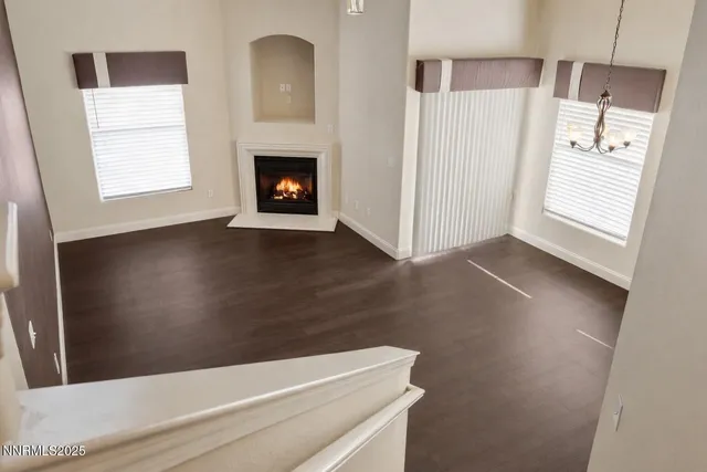 a view of livingroom and hardwood floor