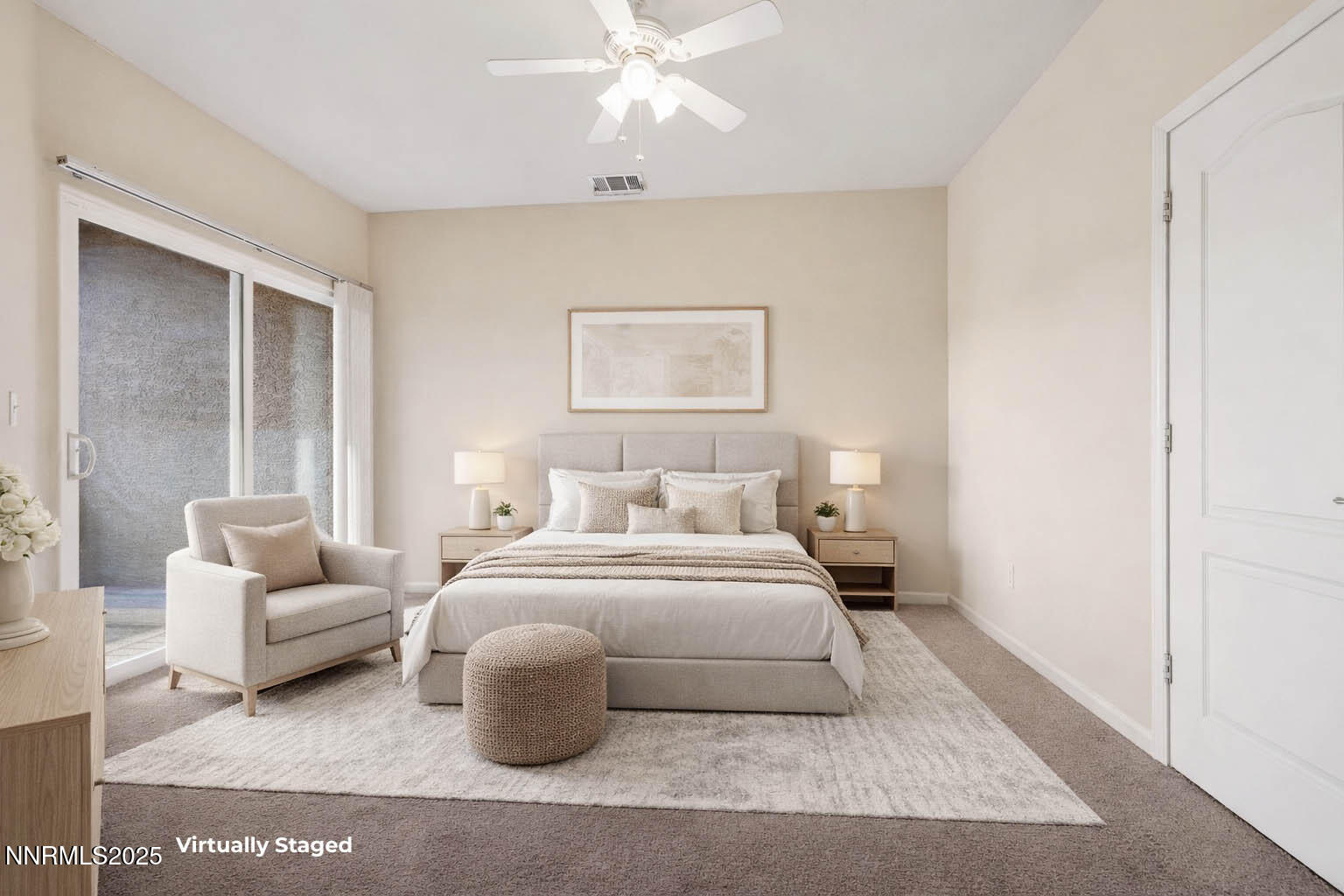 1325 South Meadows Parkway, Unit 224 Reno, NV 89521 - Photo 10 of 29 a bedroom with a white bed and a couch