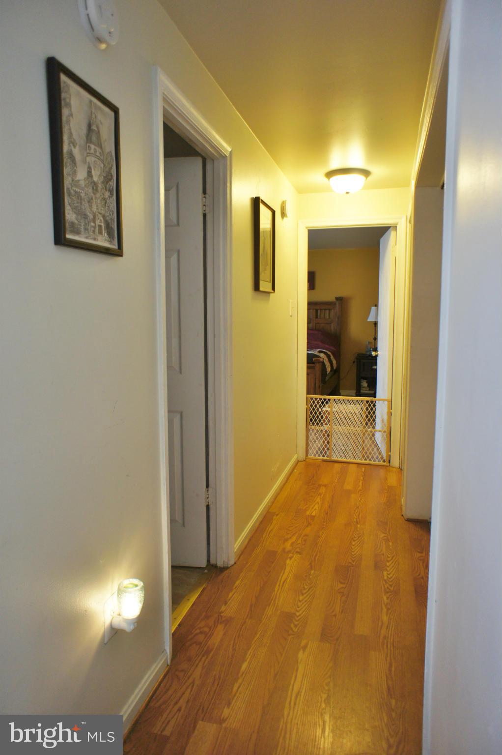 7244 Clyde Jones Road Owings, MD 20736 - Photo 13 of 26 Hallway w/washer
