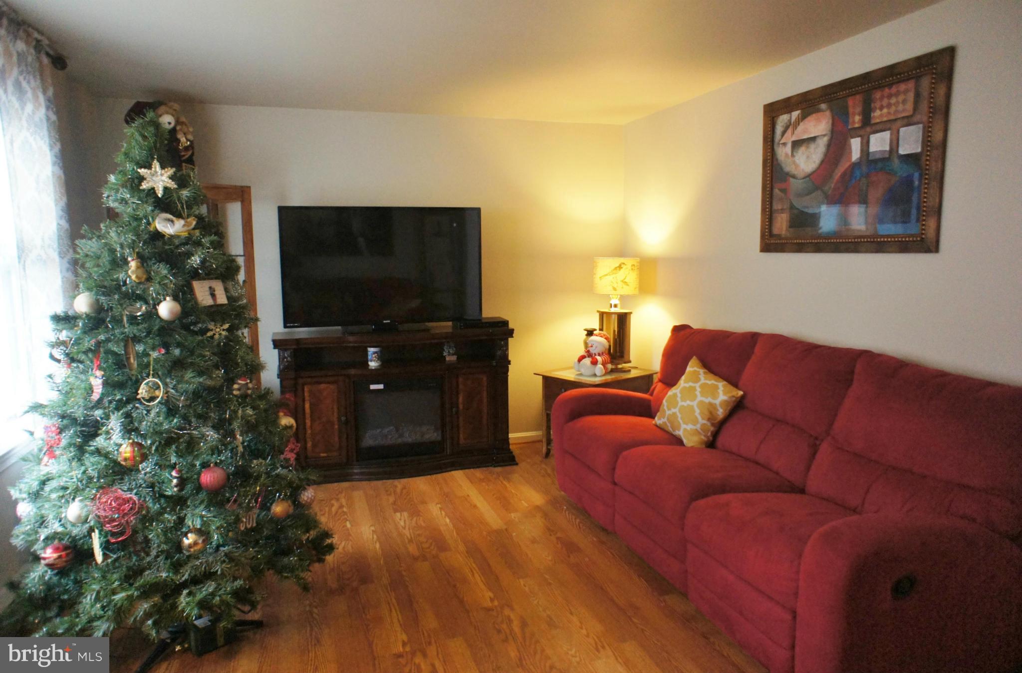 7244 Clyde Jones Road Owings, MD 20736 - Photo 3 of 26 Pergo wood floors in Living Room!