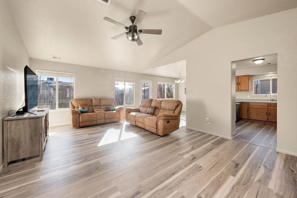 312 Catkin Street Fruita, CO 81521 - Photo 2 of 40 a living room with furniture and a wooden floor