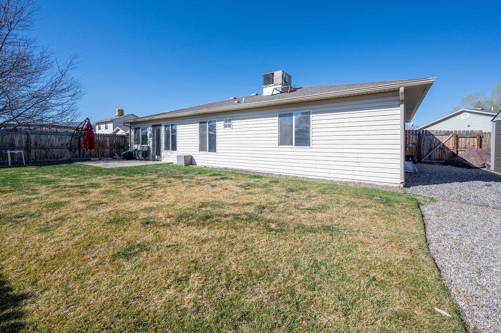 312 Catkin Street Fruita, CO 81521 - Photo 27 of 40 a view of a house with a yard