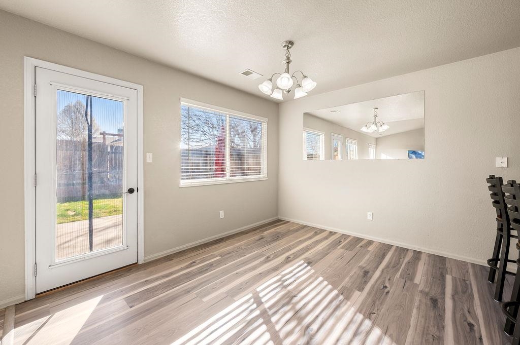 312 Catkin Street Fruita, CO 81521 - Photo 9 of 40 a view of an empty room with a window