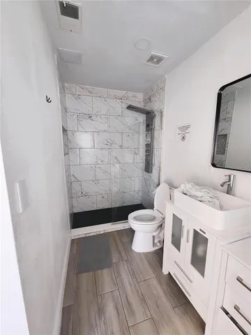 a bathroom with a sink and a toilet