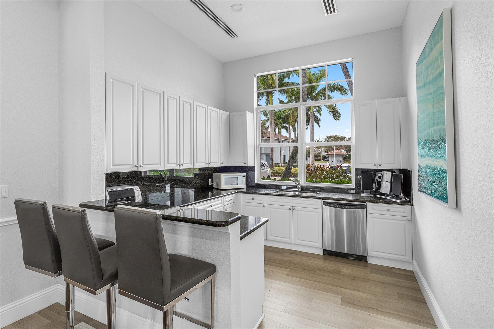 1992 Alamanda Way, Unit 1992 Riviera Beach, FL 33404 - Photo 21 of 28 Clubhouse kitchen